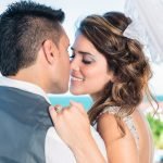 Bride about to kiss groom close-up, romantic Miami wedding photography.