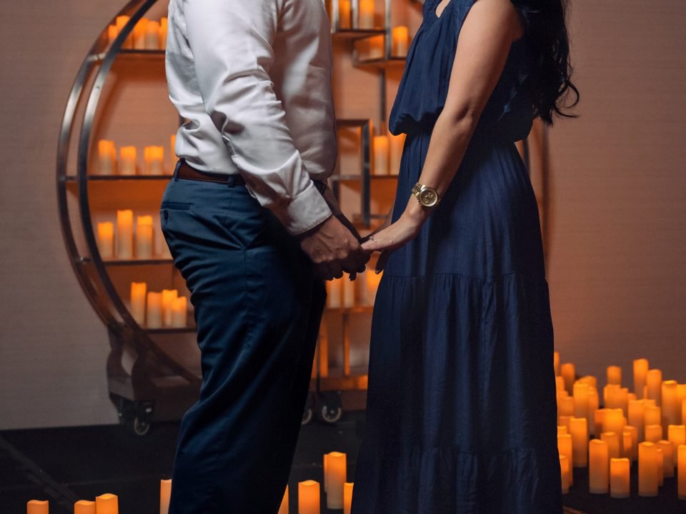 Surprise engagement proposal during a candlelight concert at Jungle Island in Miami, captured by Alito Photography, a Miami engagement and wedding photographer.