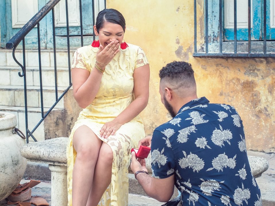Surprise engagement proposal photographed in Miami by Alito Photography during a romantic beach session.
