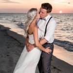 Newlyweds kissing on a Miami beach at sunset, photographed by Alito Photography for a South Florida wedding.