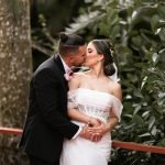 Bride and groom sharing a romantic moment at Loveland Miami captured by Alito Photography.