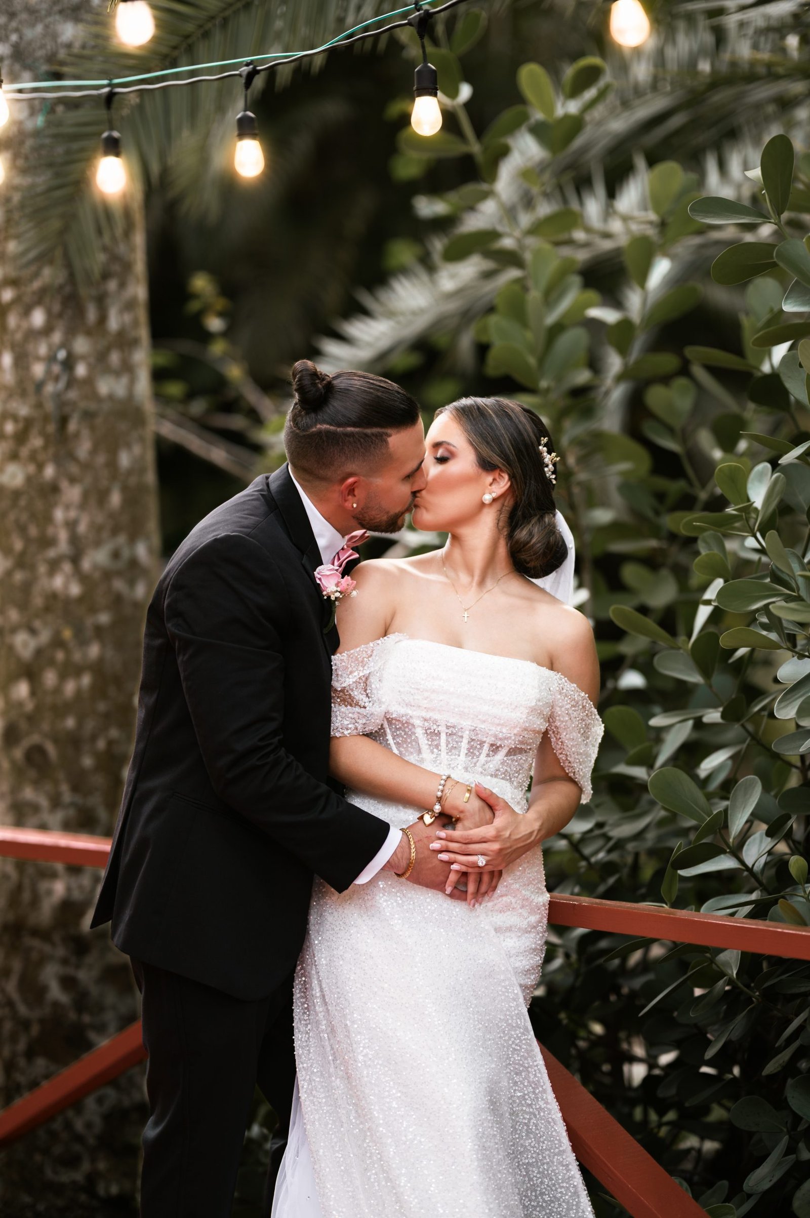 Bride and groom sharing a romantic moment at Loveland Miami captured by Alito Photography.