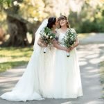 Same-sex wedding couple sharing a romantic moment during their wedding day, photographed by Miami wedding photographer Alito.