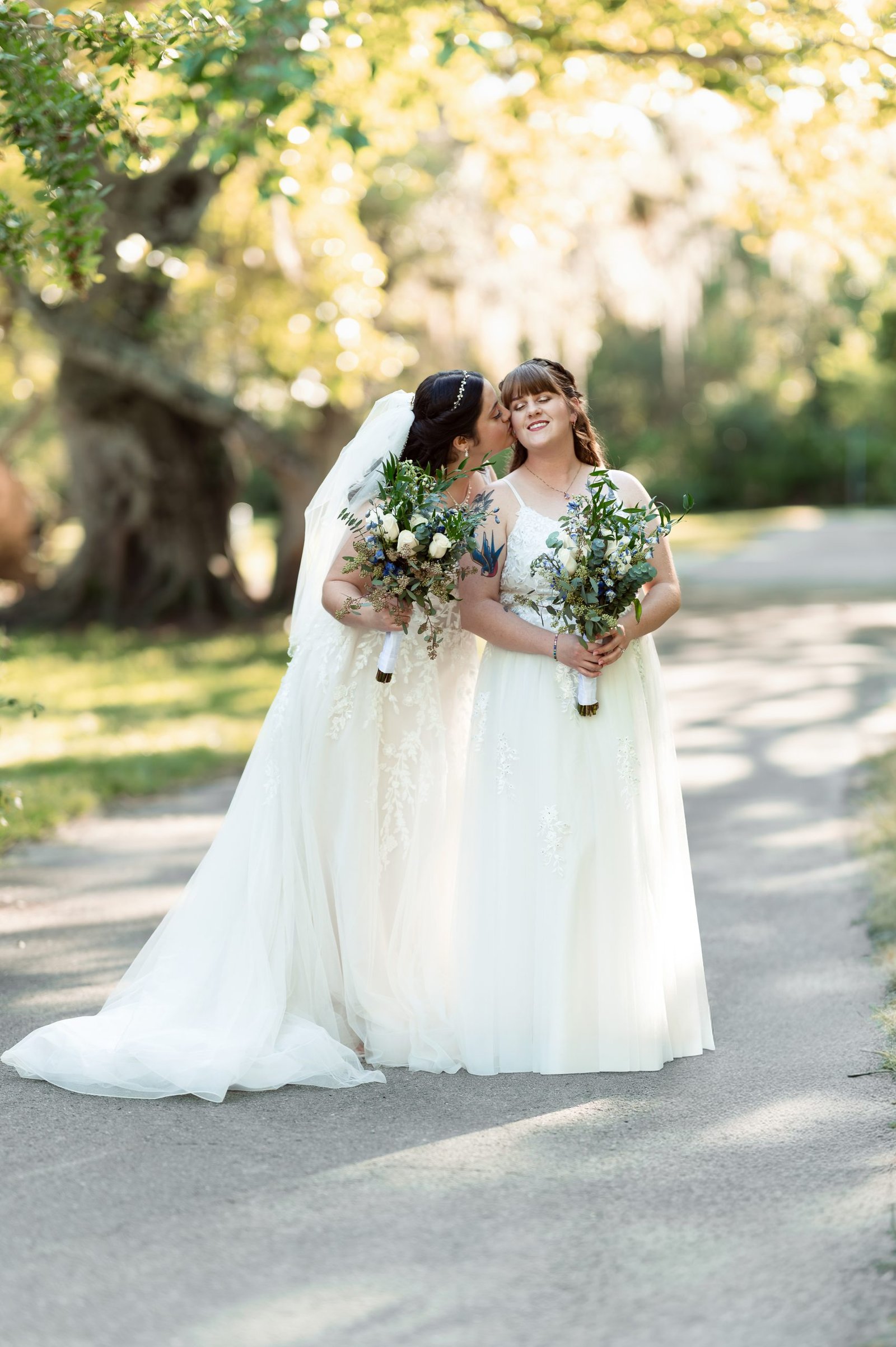 Same-sex wedding couple sharing a romantic moment during their wedding day, photographed by Miami wedding photographer Alito.